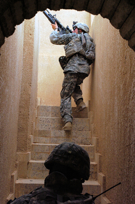 82nd Airborne Soldiers Climb To The Roof Of A House In Owja, Iraq