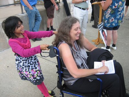 Halima And Kathy Manley Play With The Wife's Abandoned Wheelchair